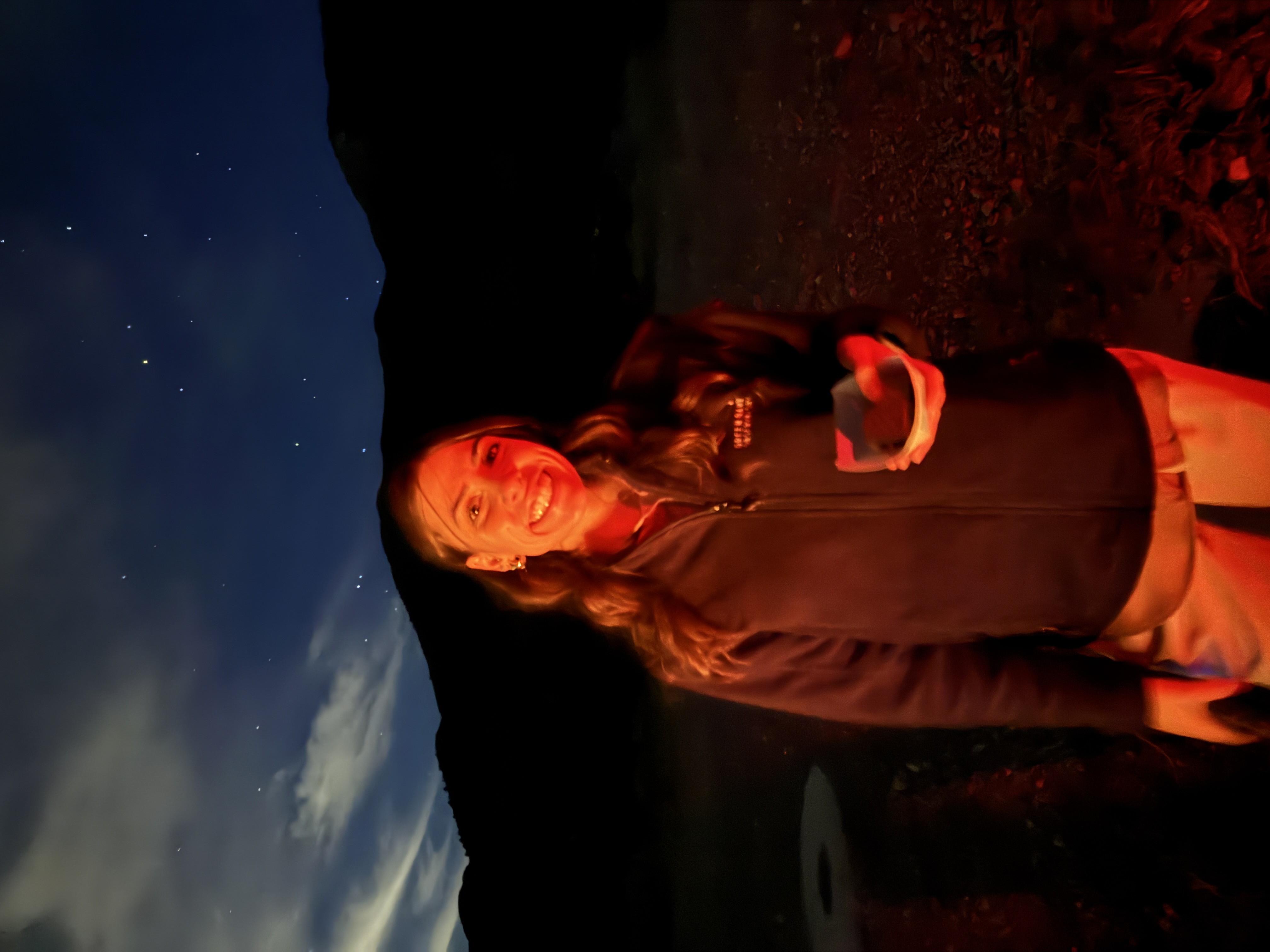 Rachel with a s'mores around the campfire