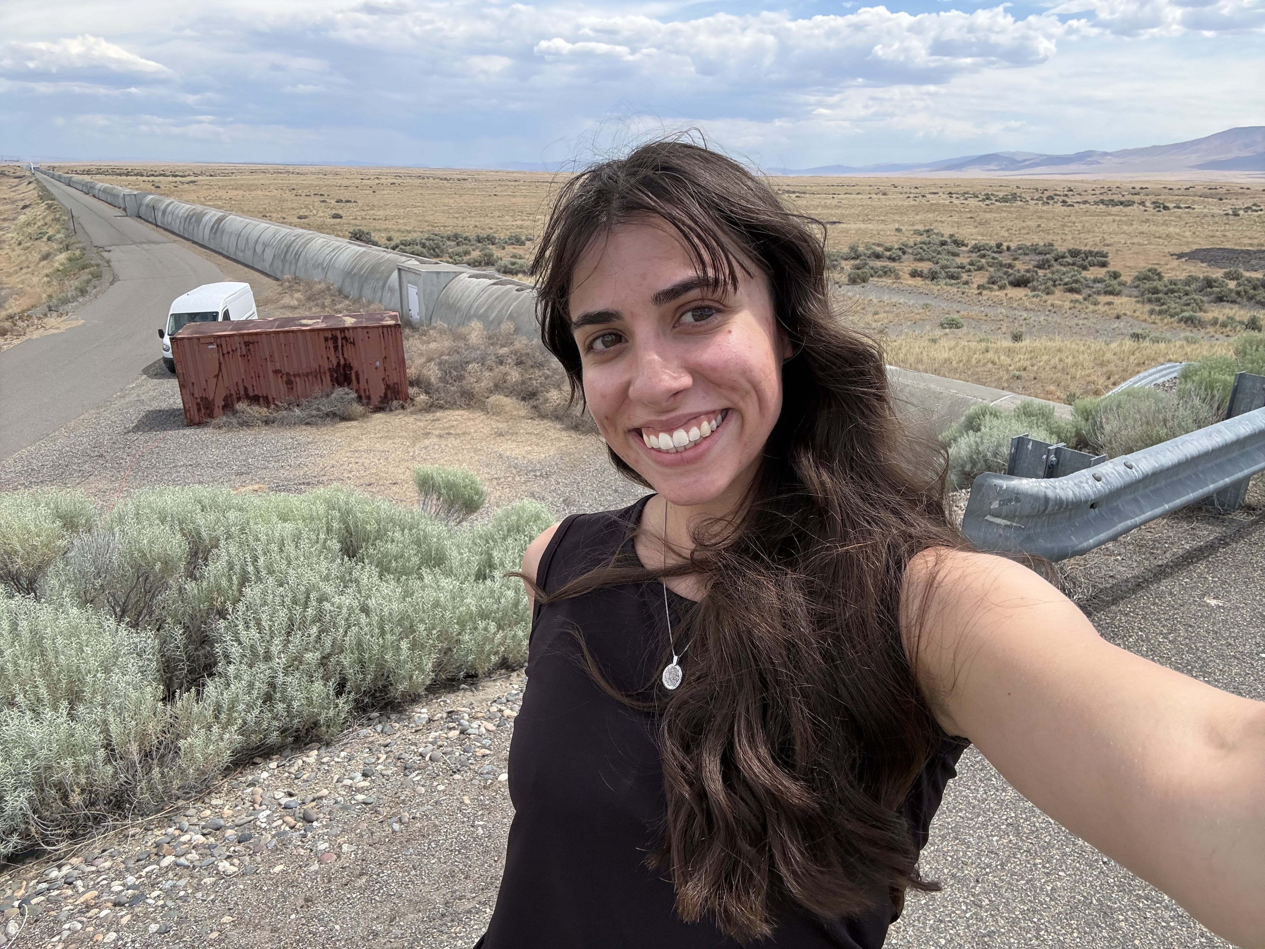 Obligatory selfie in front of X-arm at LIGO Hanford Observatory, one of the two 4 km (2.5 mi) vacuum tubes configured in an L-shape that makes the interferometer.